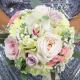 Круглый букет невесты из пионовидных роз, орхидеи и гипсофилы