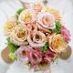 Свадебный букет из персиковых роз и зелени